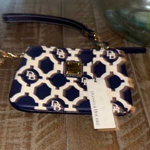 NWT, Dooney & Bourke  navy/ white key  wristlet .